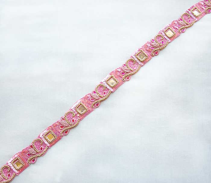 are pink tambour embroidery chain stitch done with a hook in pink and 